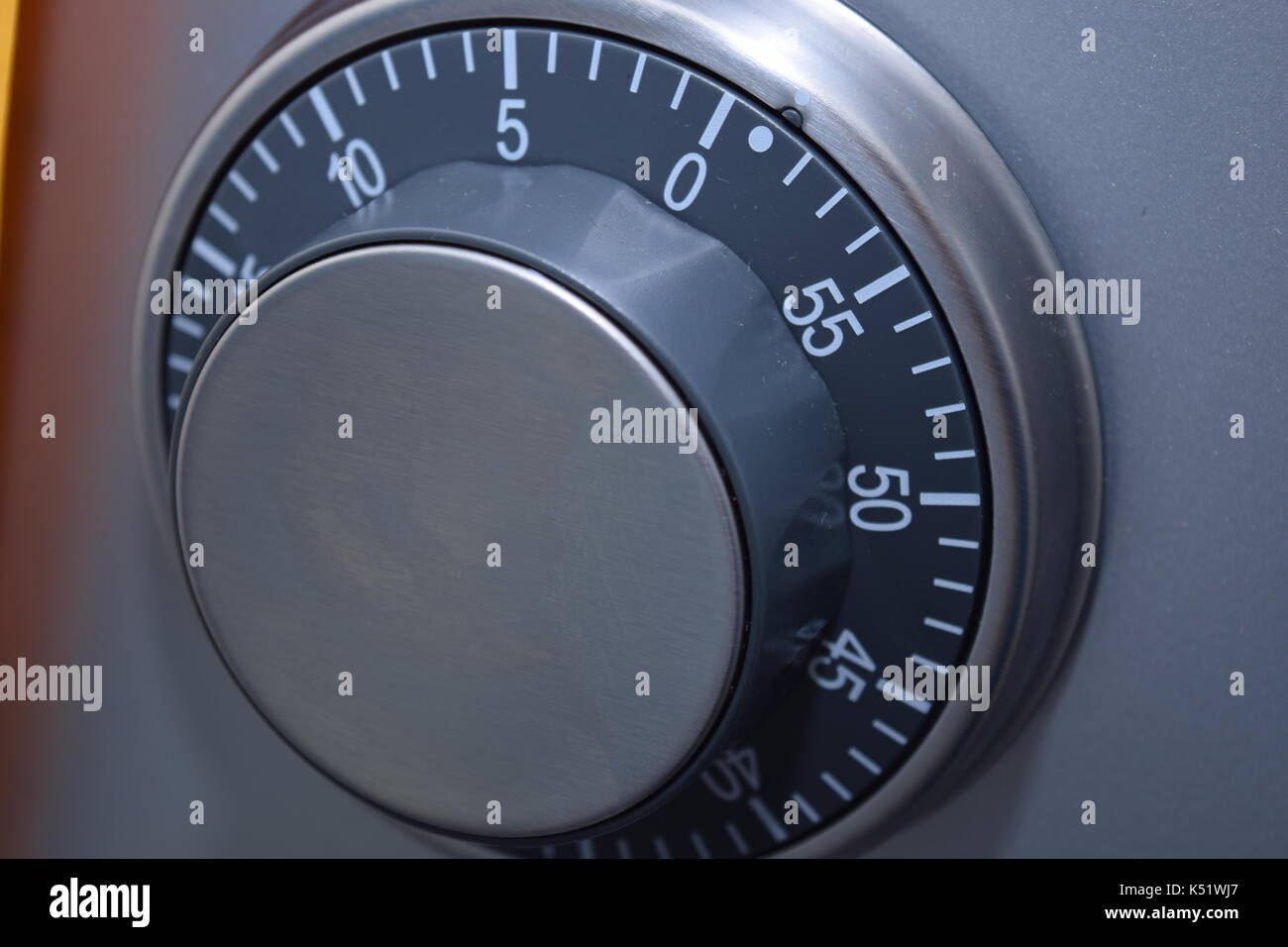 Round kitchen timer on a refrigerator Stock Photo Alamy
