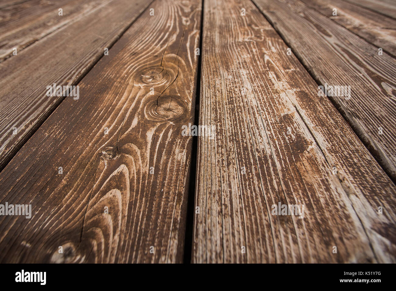 Close up of brown wooden fence panels. Wood floor texture of boards. closeup Stock Photo