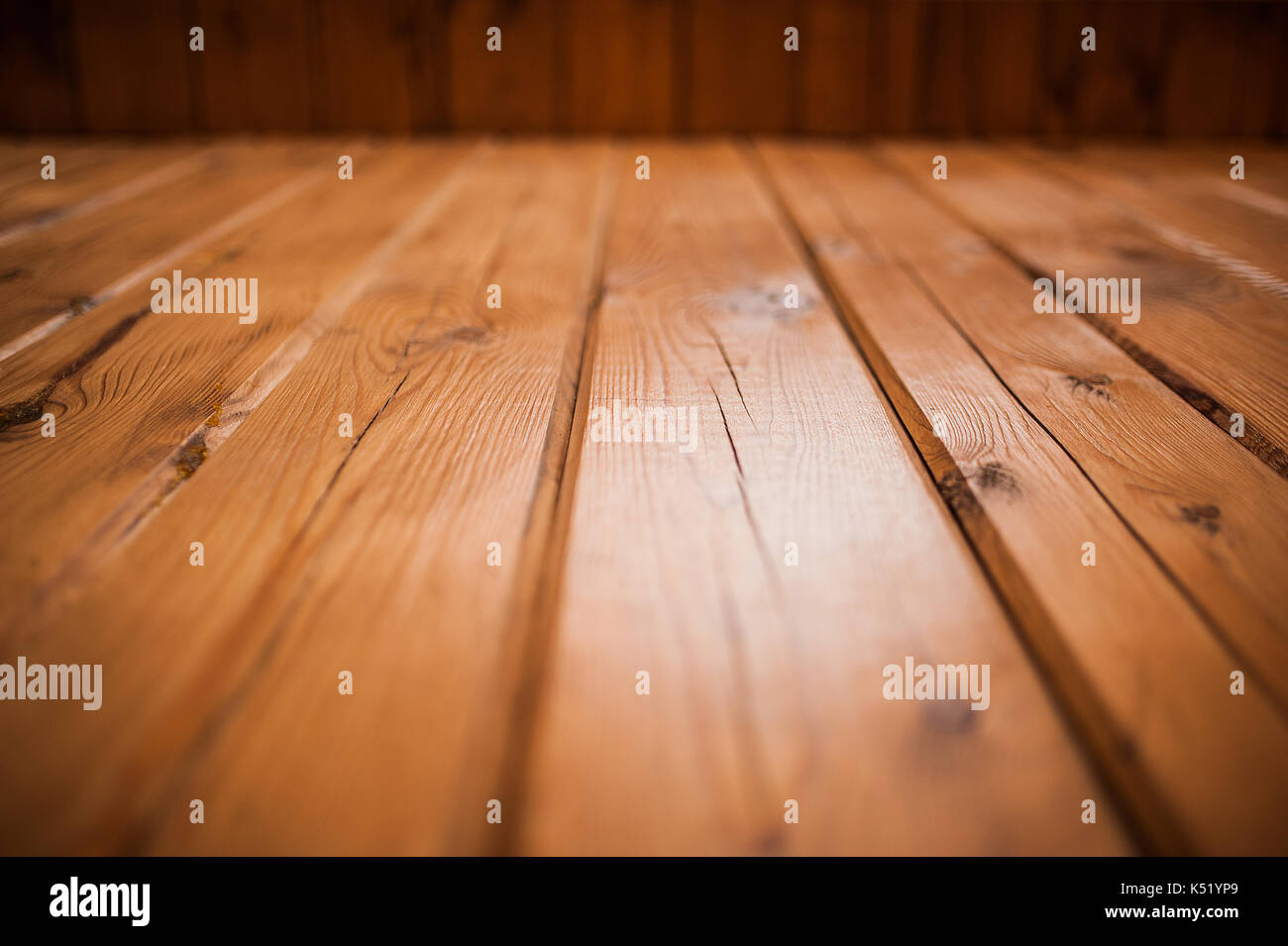 Texture - wooden boards brown color. Texture of a wooden wall from a bar. close Stock Photo