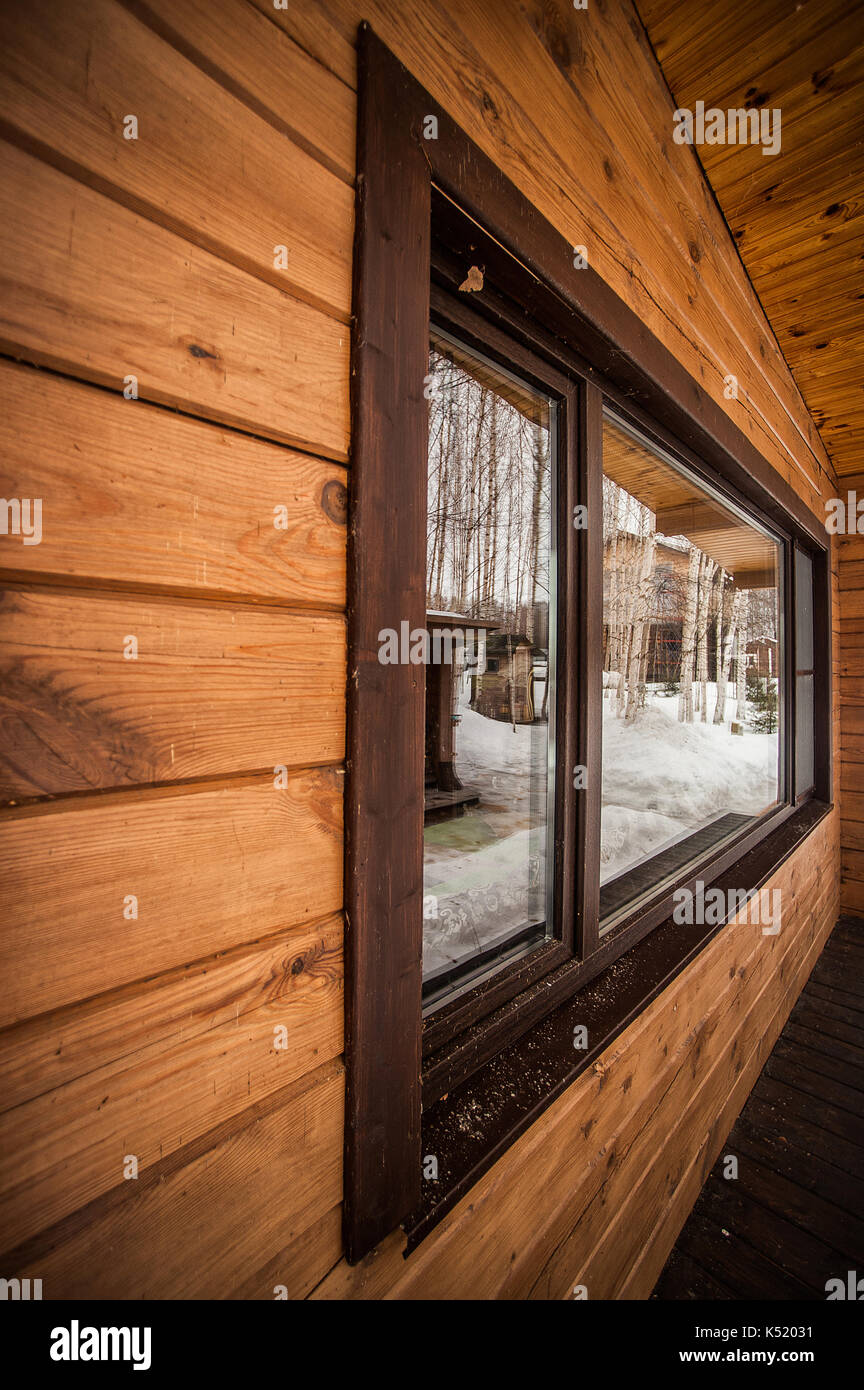 Window of a wooden house. in perspective view Stock Photo