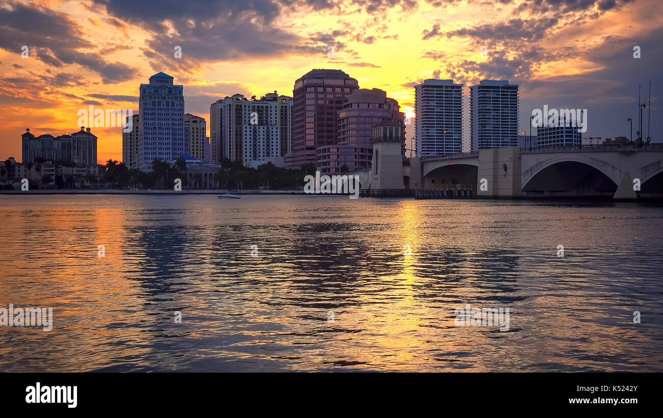 Dramatic sunset sky behind the skyline of West Palm Beach, Florida Stock Photo