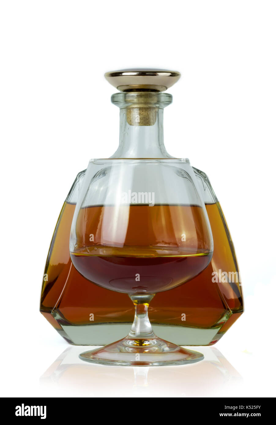 bottle of brandy with brandy poured in a glass Stock Photo Alamy