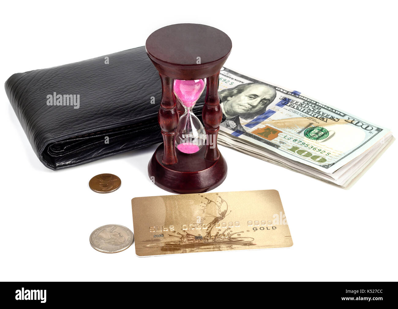 Dollars, cents, a plastic card, a purse, an hourglass Stock Photo