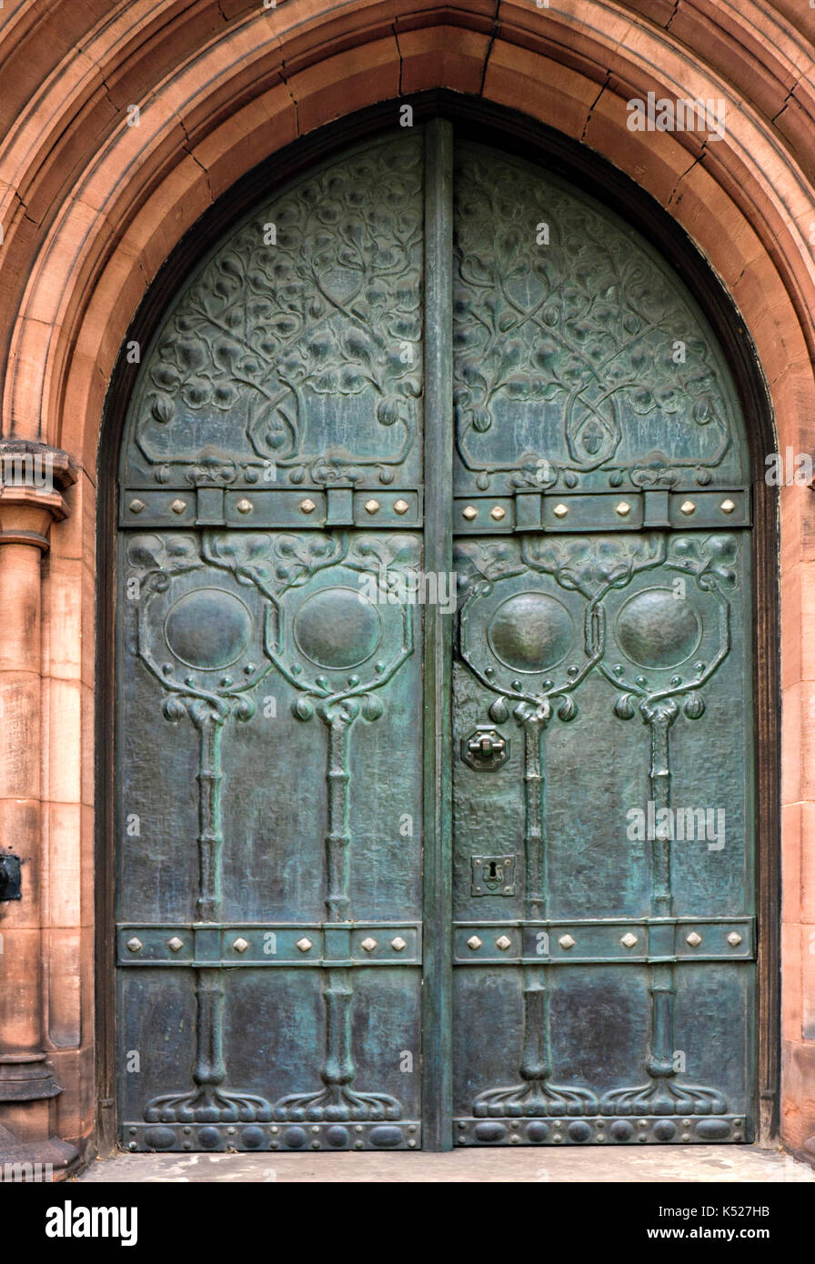 Decorative Art Nouveau door of the Unitarian Church,Ullet Road, Liverpool, by Thomas Worthington 1896-9 featuring stained glass by Robert Morris. Stock Photo