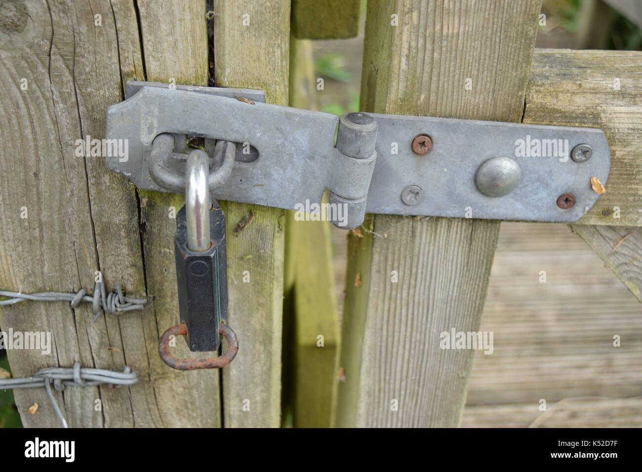 Close Up Of A Silver Wooden Gate Hinge Stock Photo