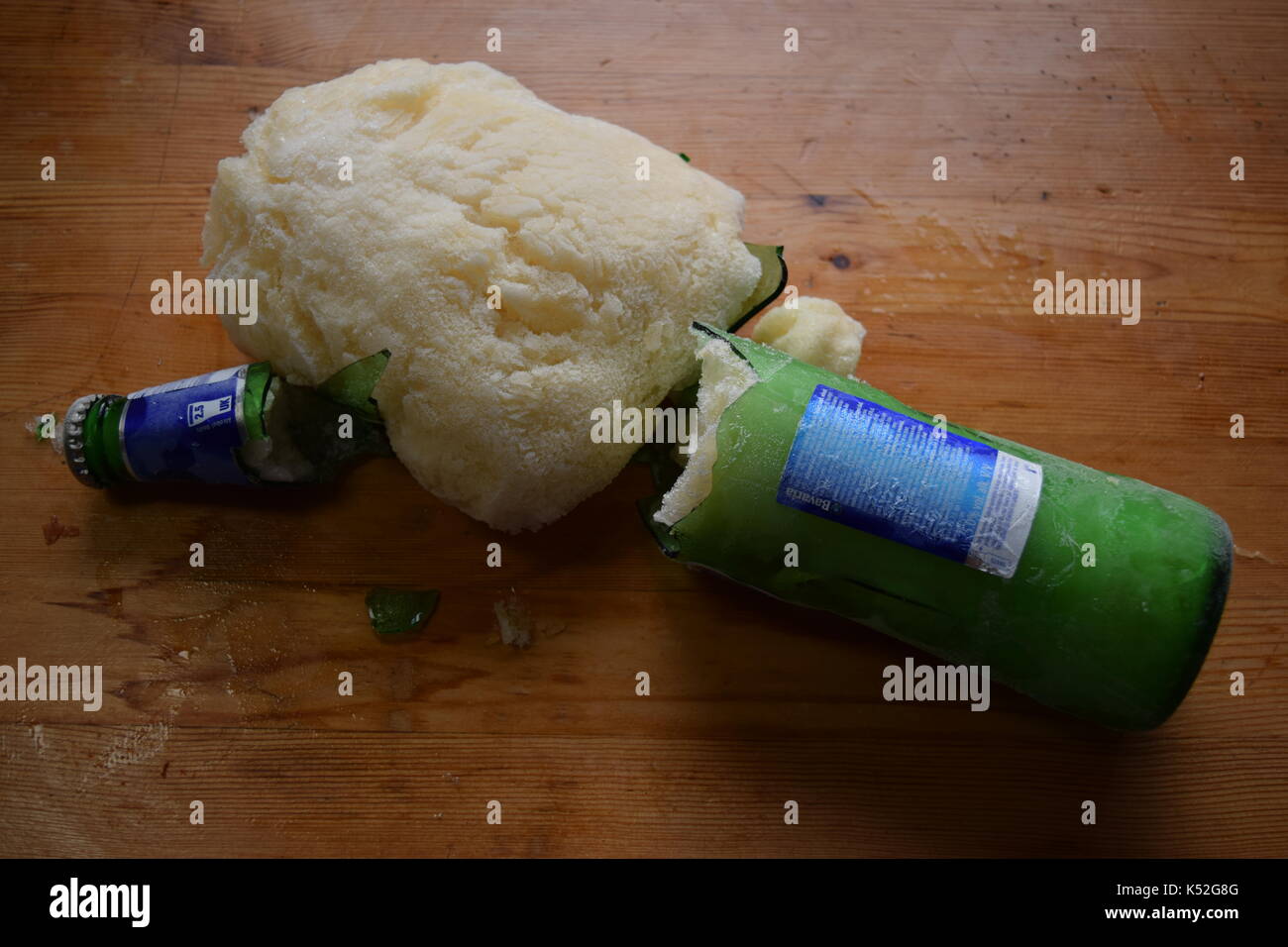 Frozen beer exploded in a green beer bottle Stock Photo Alamy