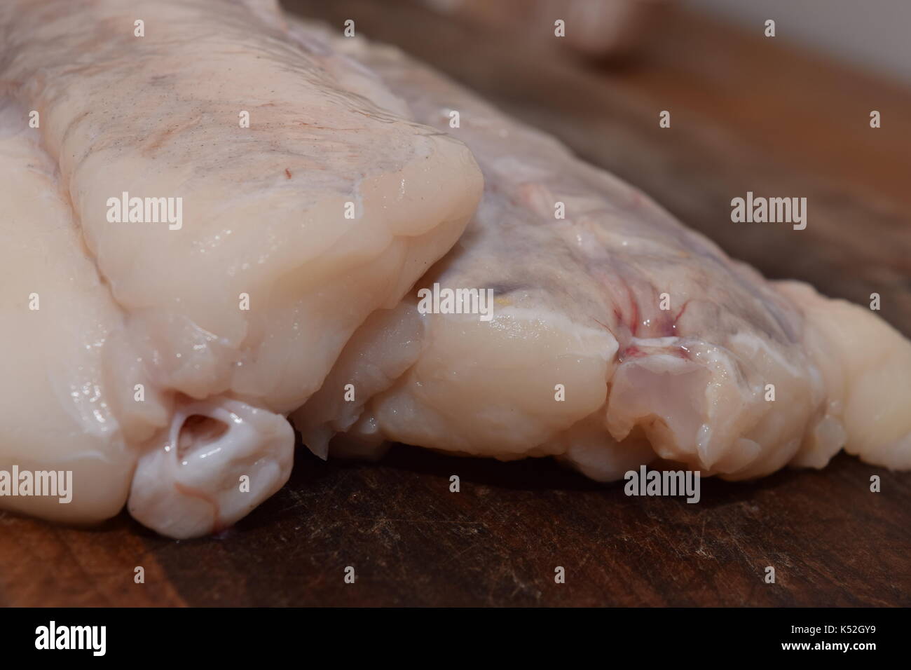 Close up of wet raw fish Stock Photo