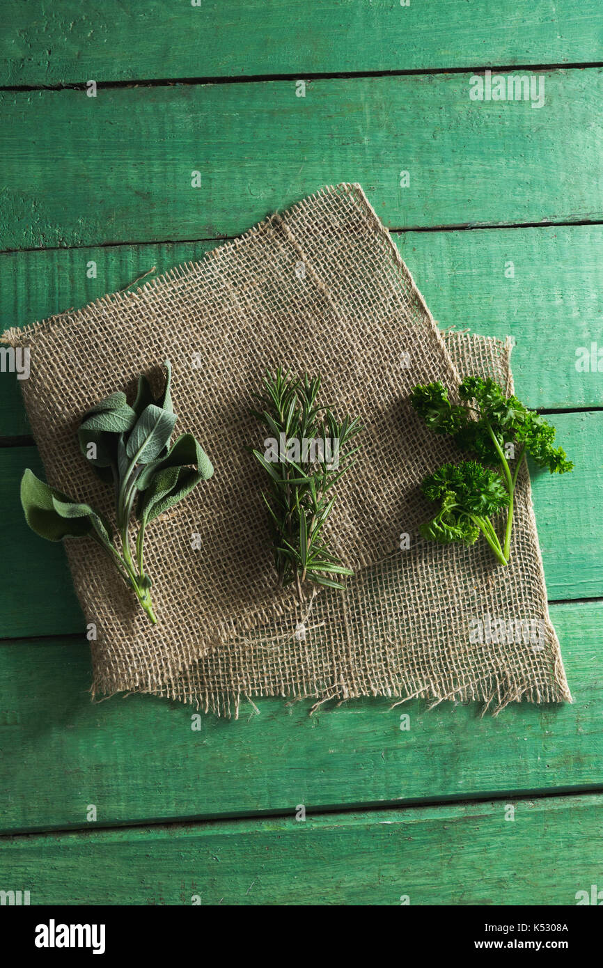 Overhead of various type of herbs on sack Stock Photo