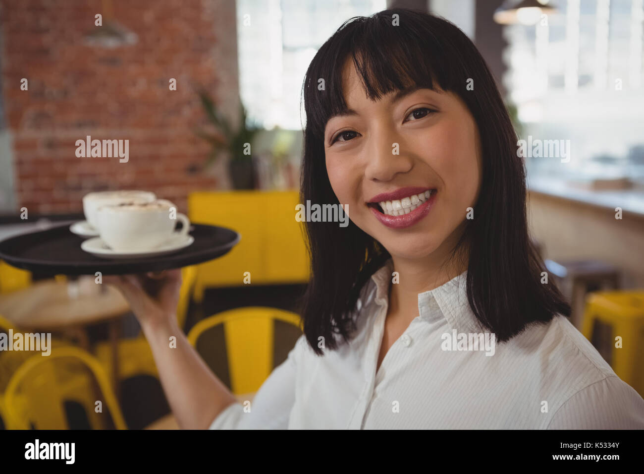 Asian waitress tray food hi-res stock photography and images - Alamy