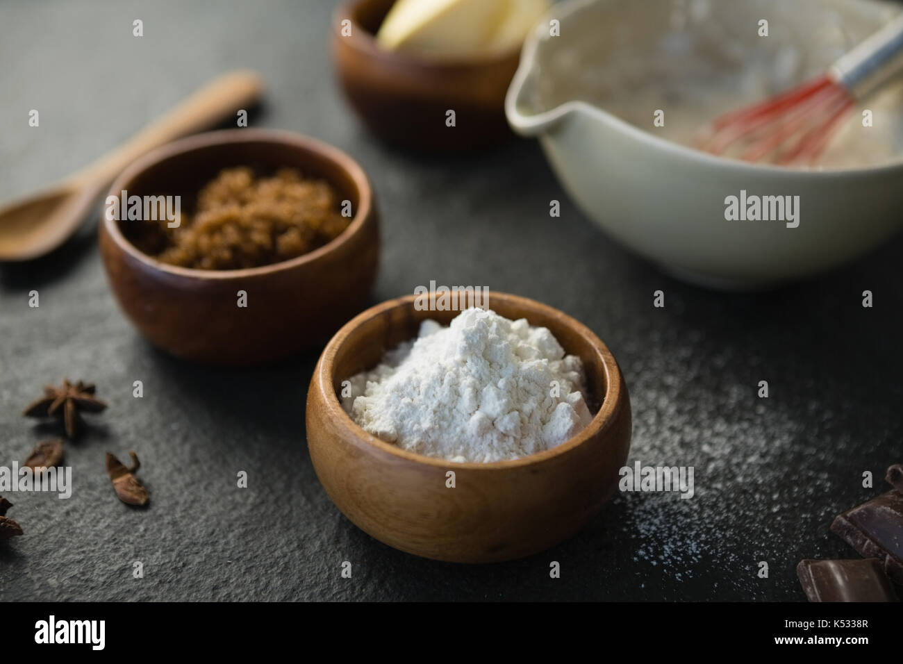 Close up of flour and grounded food on table Stock Photo