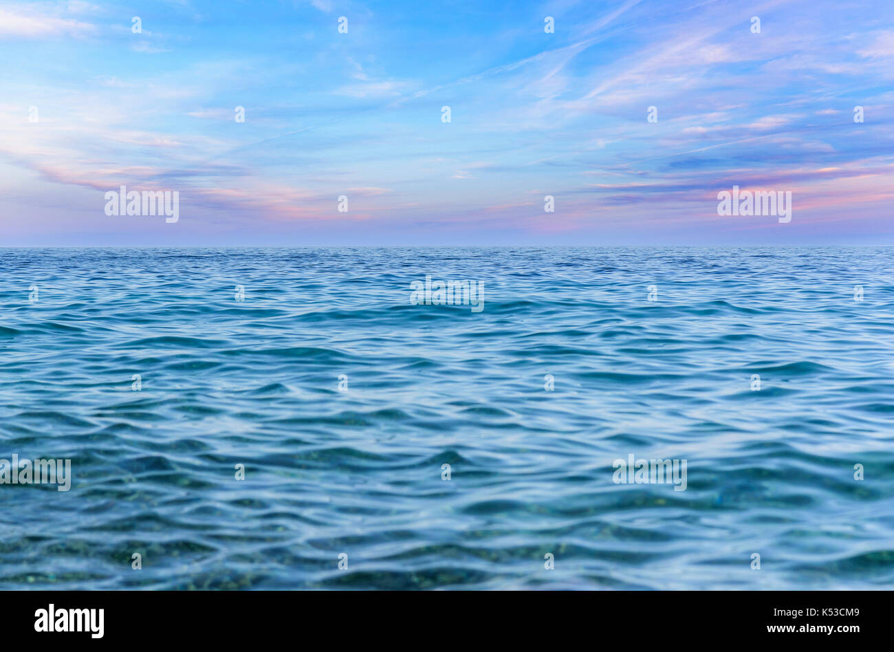 Blue sky with clouds over the sea Stock Photo - Alamy
