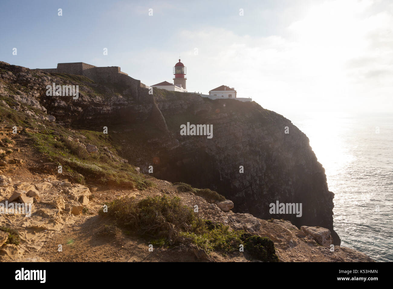 Cape St. Vincent, Portugal: Cape St. Vincent Lighthouse at sunset. The cape is the southwestern most point in Portugal and continental Europe. Stock Photo
