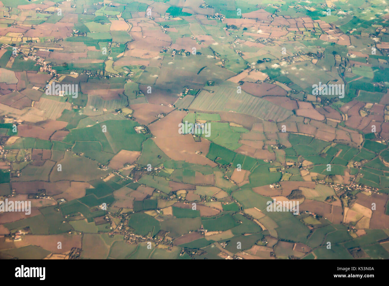 Small city and  Farm landscape with some clouds made from airplane illuminator Stock Photo