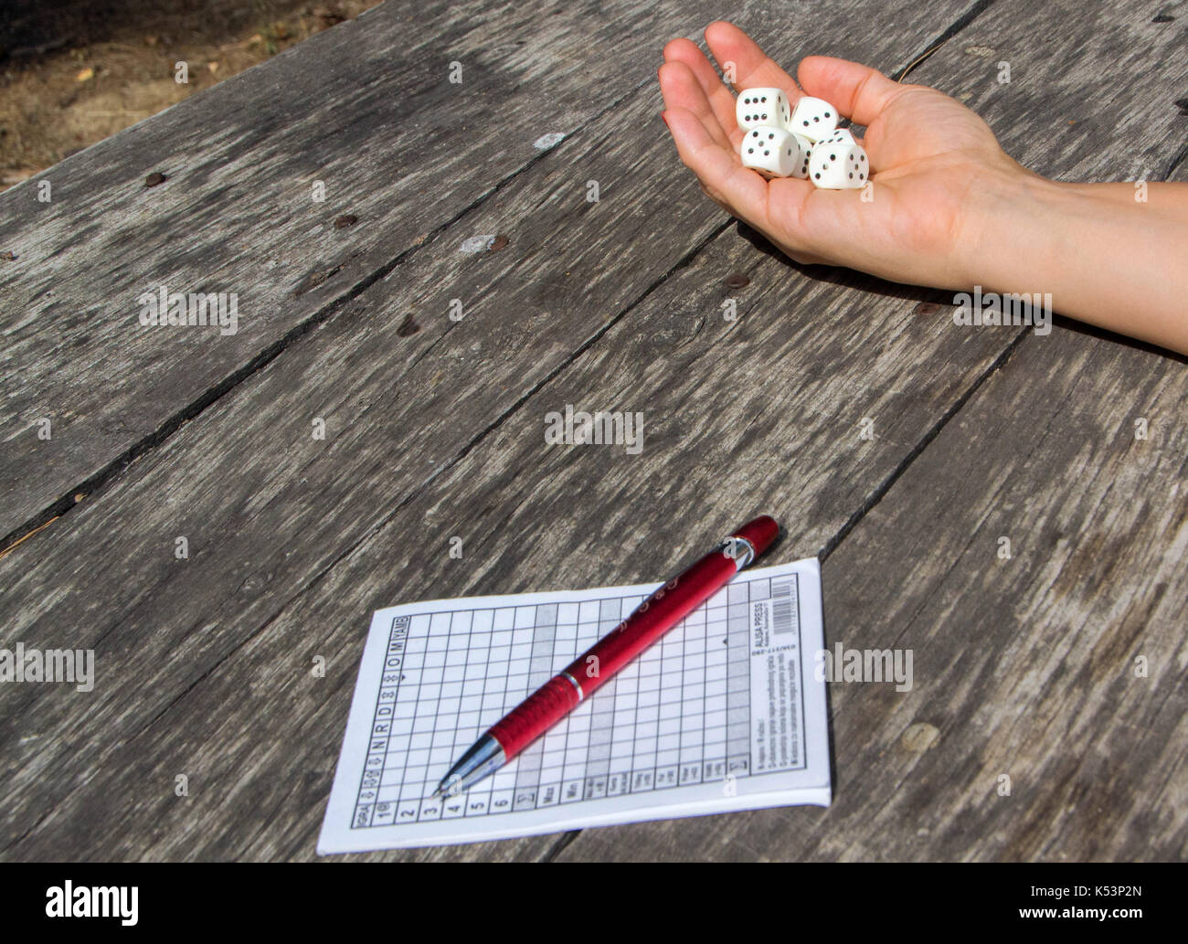 Hand throws dice hires stock photography and images Alamy