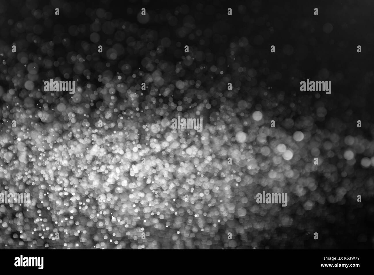 Abstract background glitter snow on black surface Stock Photo - Alamy