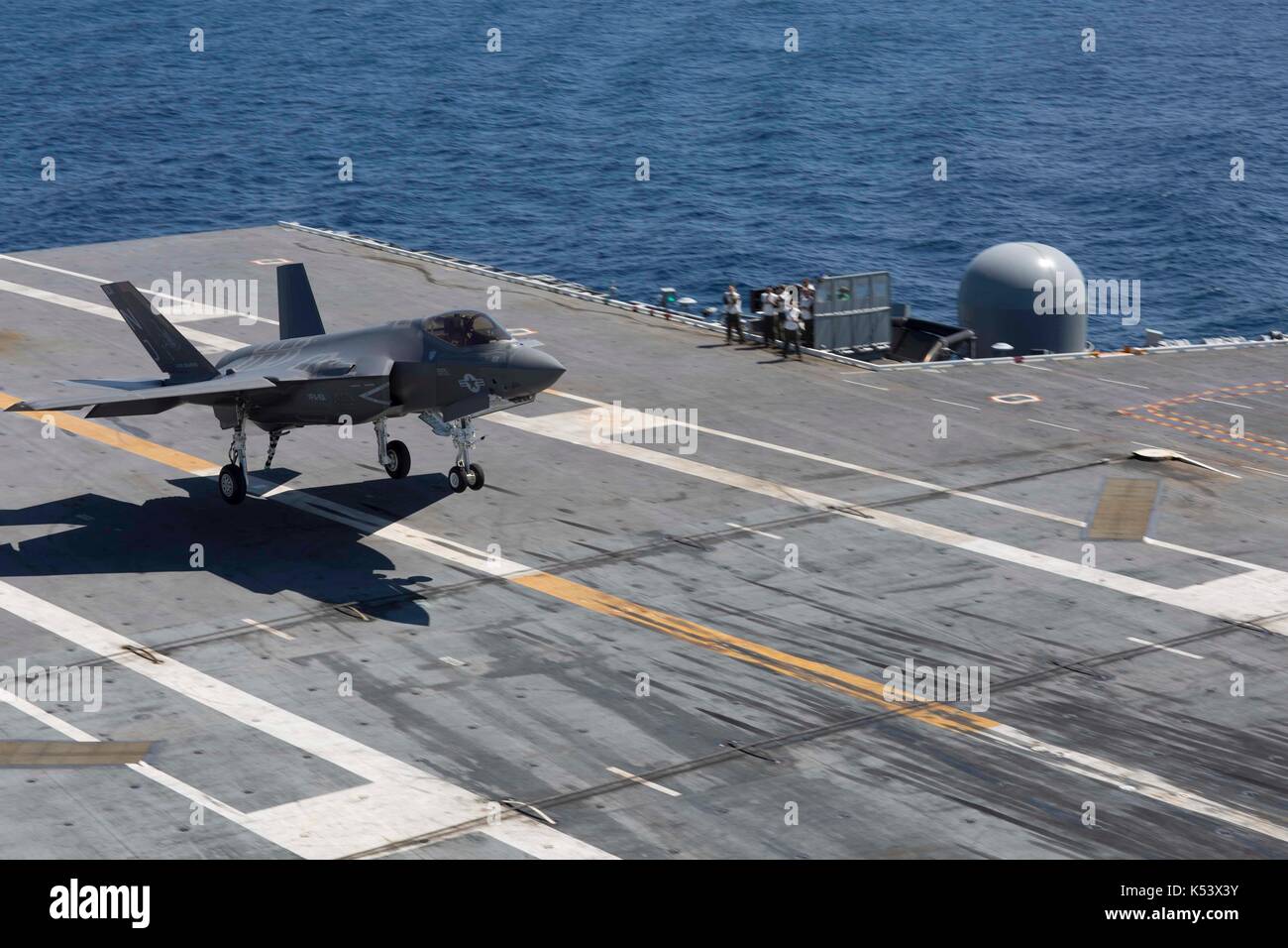 F-35C Lightning II Aboard the Flight Deck of USS Abraham Lincoln Aircraft Carrier. Stock Photo