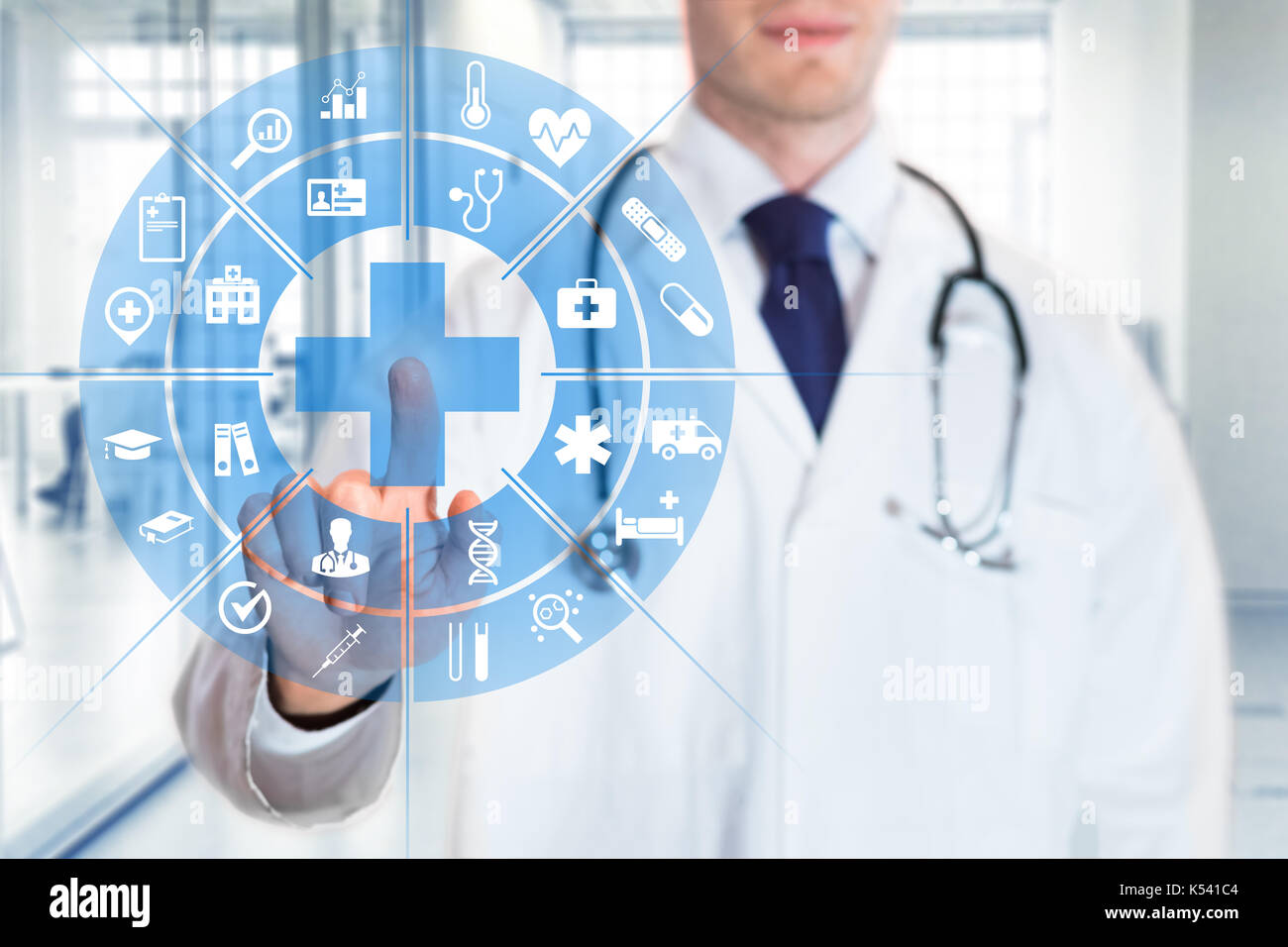 Medical doctor touching AR futuristic computer interface with concept about health care services, hospital background Stock Photo