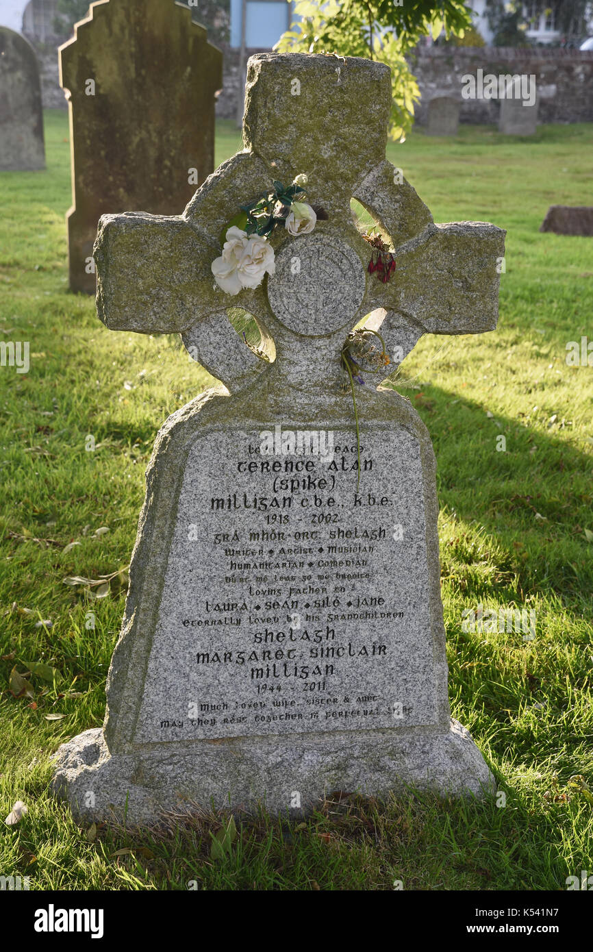 Spike Milligan's Gravestone,with the epitaph 'I told you I was ill' written in Gaelic,St Thomas's Church,Winchelsea,East Sussex.UK Stock Photo