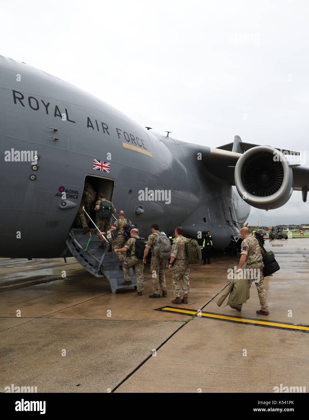 Soldiers board a Royal Air Force C-17 Globemaster III aircraft at Brize Norton, Oxfordshire, before they are flown to help out in the areas affected by Hurricane Irma as winds of up to 175mph left death and destruction in the Atlantic. Stock Photo