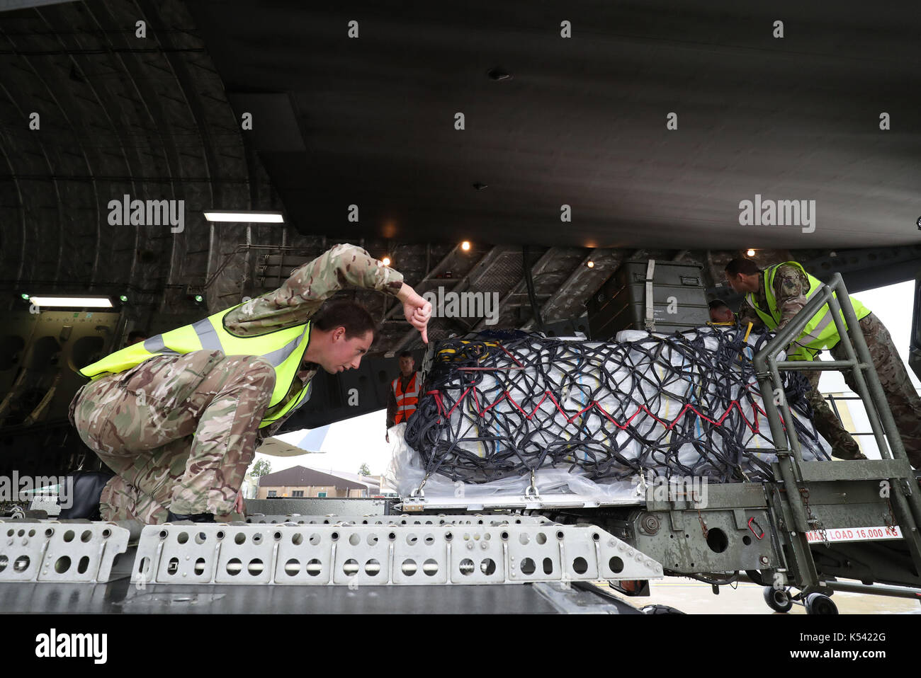 Dfid aid is loaded onto a Royal Air Force C-17 Globemaster III aircraft at Brize Norton, Oxfordshire, before it is flown to the areas affected by Hurricane Irma as winds of up to 175mph left death and destruction in the Atlantic. Stock Photo