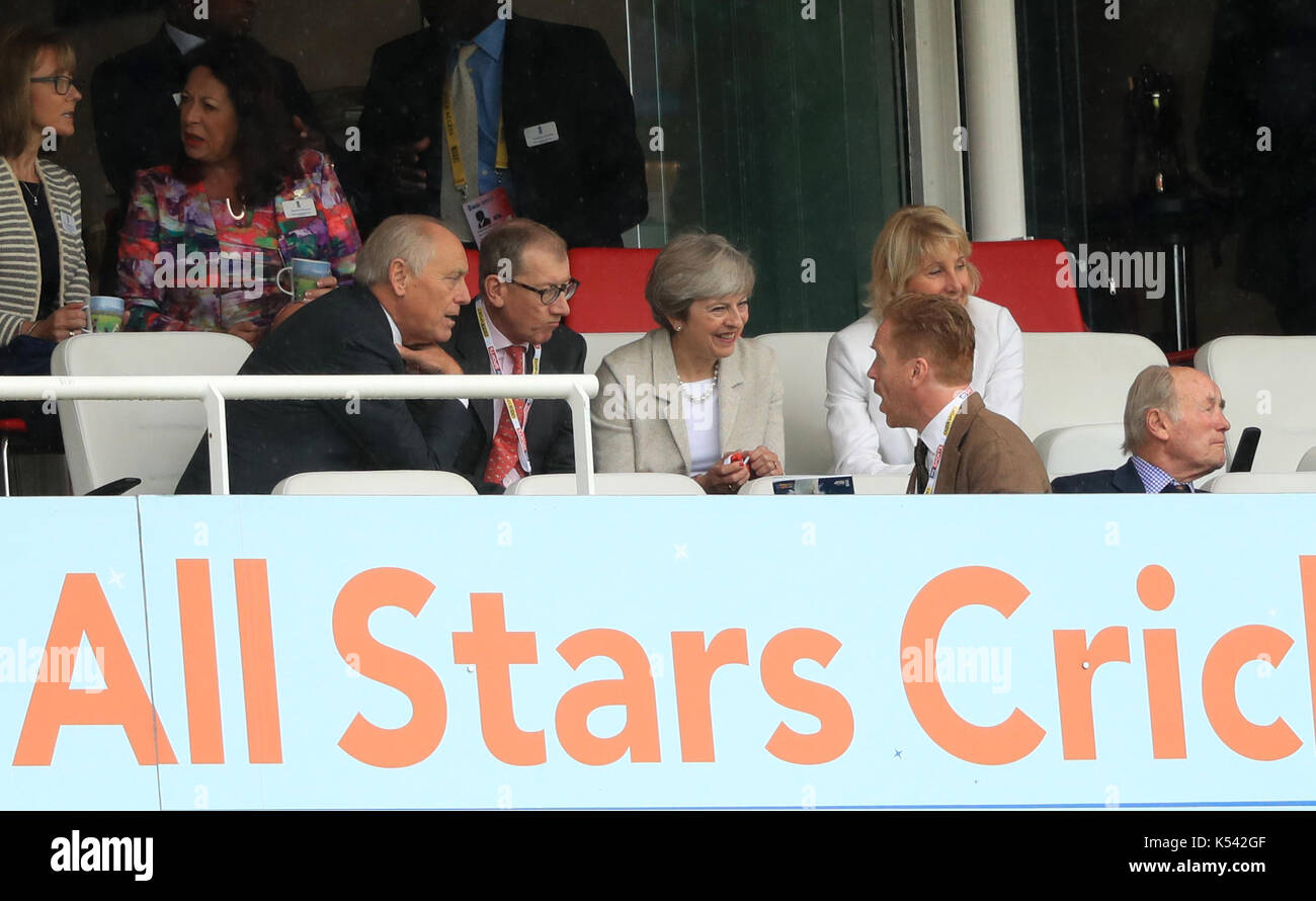 Prime Minister Theresa May (third left) speaks to actor Damian Lewis alongside husband Philip May (second left) and ECB Chairman Colin Graves (left) during day two of the Third Investec Test match at Lord's, London. Stock Photo