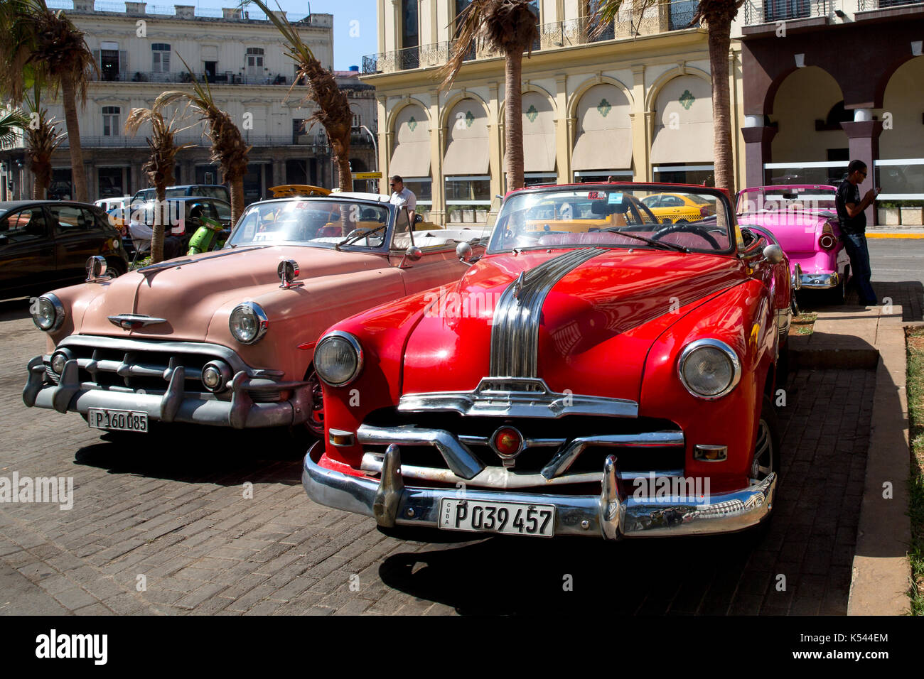 1950's cars parked on a street in the middle of Havana, Cuba in the Caribbean. Stock Photo