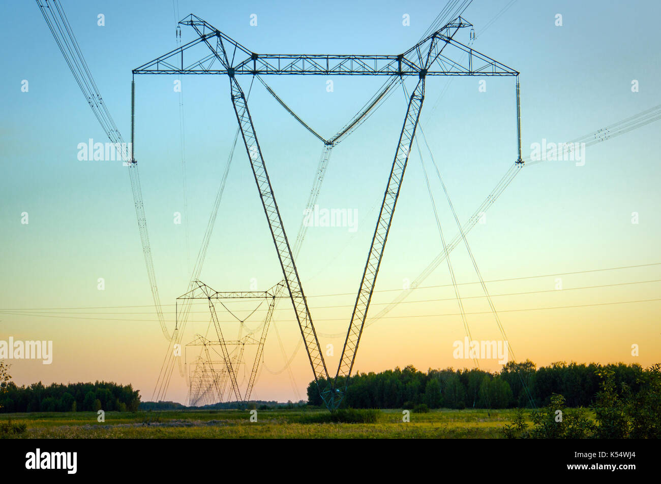 high voltage post. High-voltage tower sky background. Stock Photo