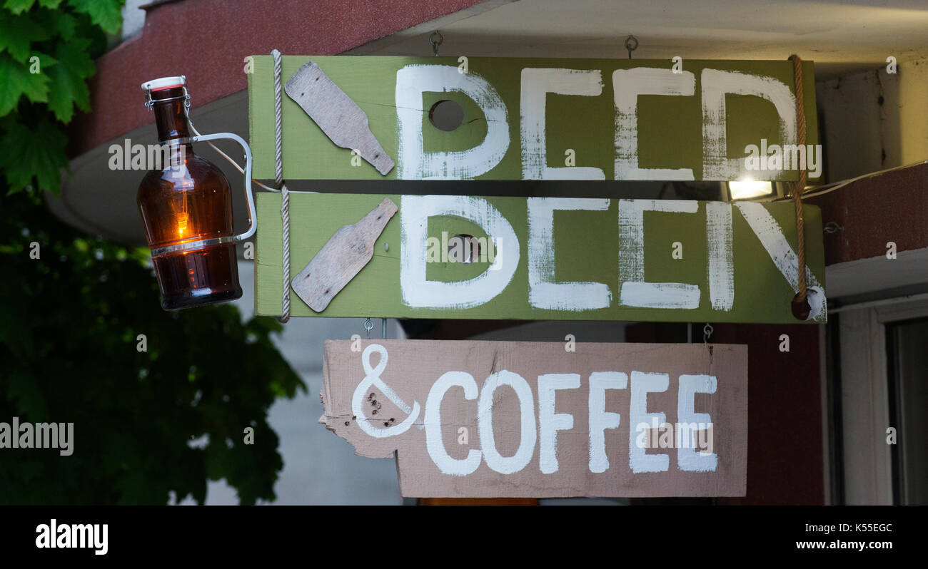 Sign outside a restaurant in Varna advertising beer and coffee. Stock Photo