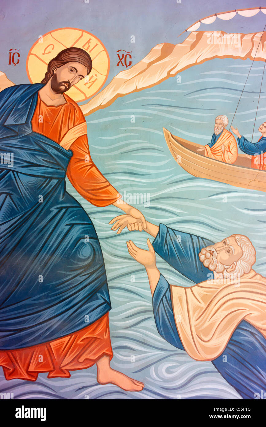 Jesus Christ saving Peter as they walked on the water in this mural in the St. Nicholas Church, Varna. Stock Photo