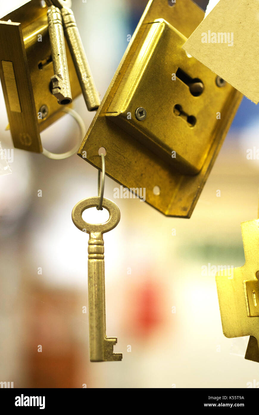 Key holder with keys hanging on the wall Stock Photo - Alamy