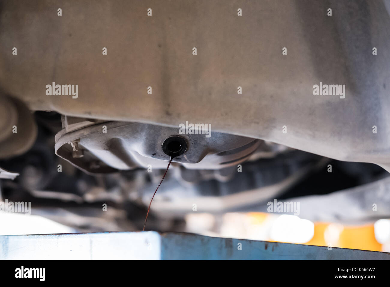 vehicle lift up by hydraulic for engine oil change and transmission