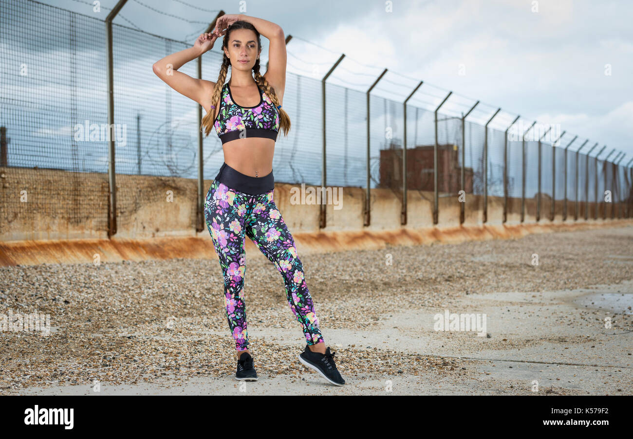 woman stretching before exercise Stock Photo