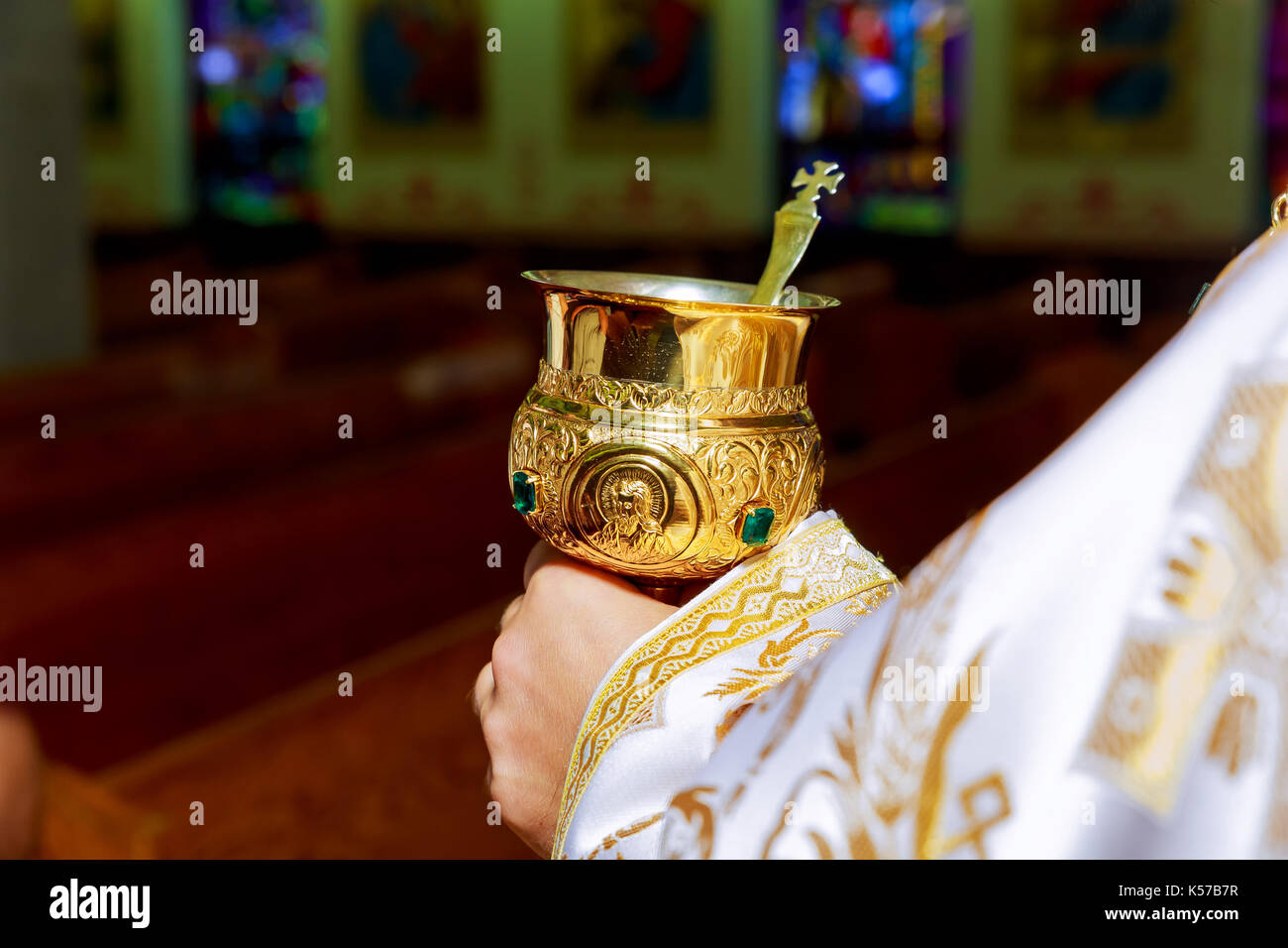 catholic priest with chalice cup during consecration ceremony church, mass, catholic Stock Photo