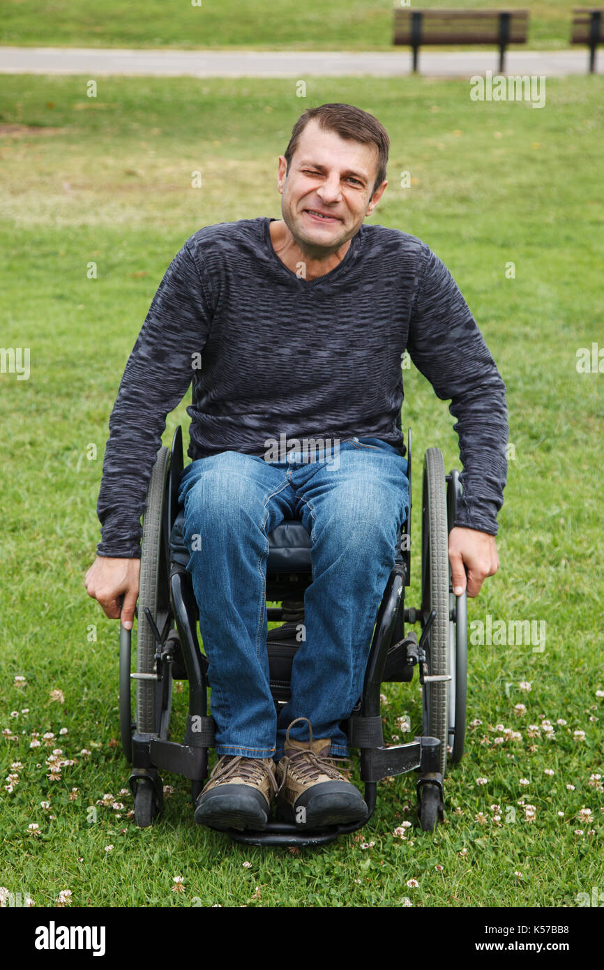 Disabled man in awheelchair Stock Photo