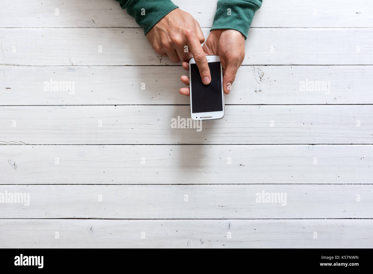 Mobile phone in hands closeup. Network addicted concept Stock Photo