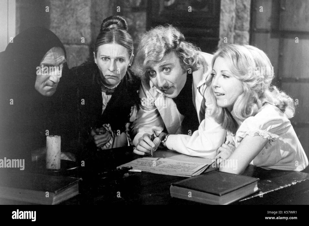 Photo Must Be Credited ©Alpha Press 070000 (1974) Marty Feldman as Igor, Cloris Leachman as Frau Blucher, Gene Wilder as Dr. Frankenstein and Teri Garr as Inga in the movie Young Frankenstein. Stock Photo