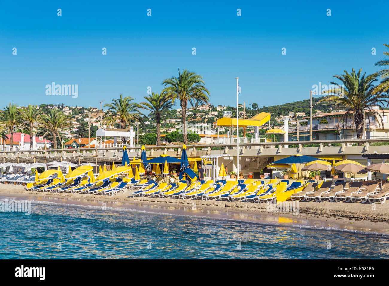 Rows of empty beach lounges in Juan les Pins, France Stock Photo - Alamy
