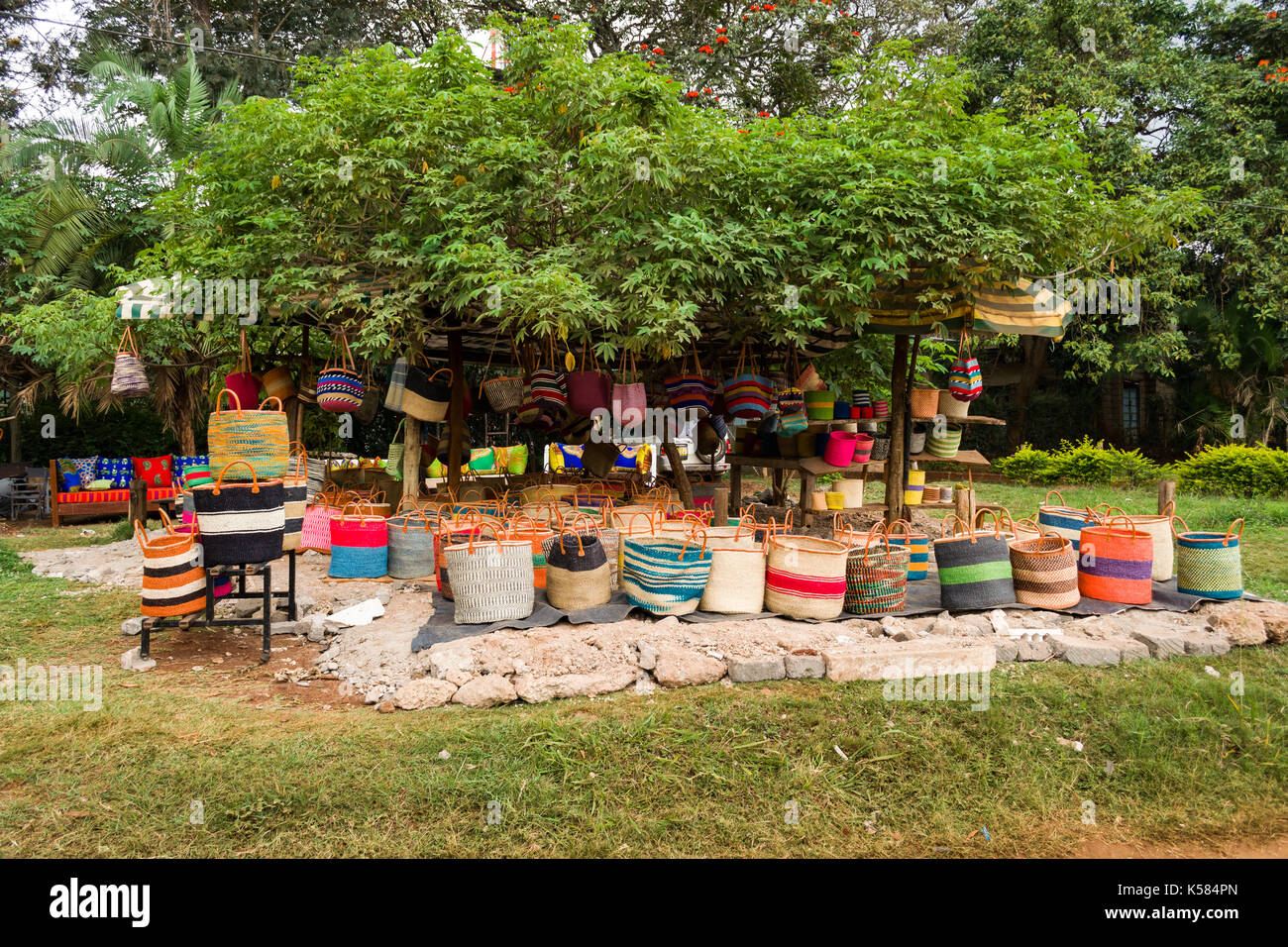 Various handmade sisal woven baskets and bags on display by roadside, Nairobi, Kenya Stock Photo