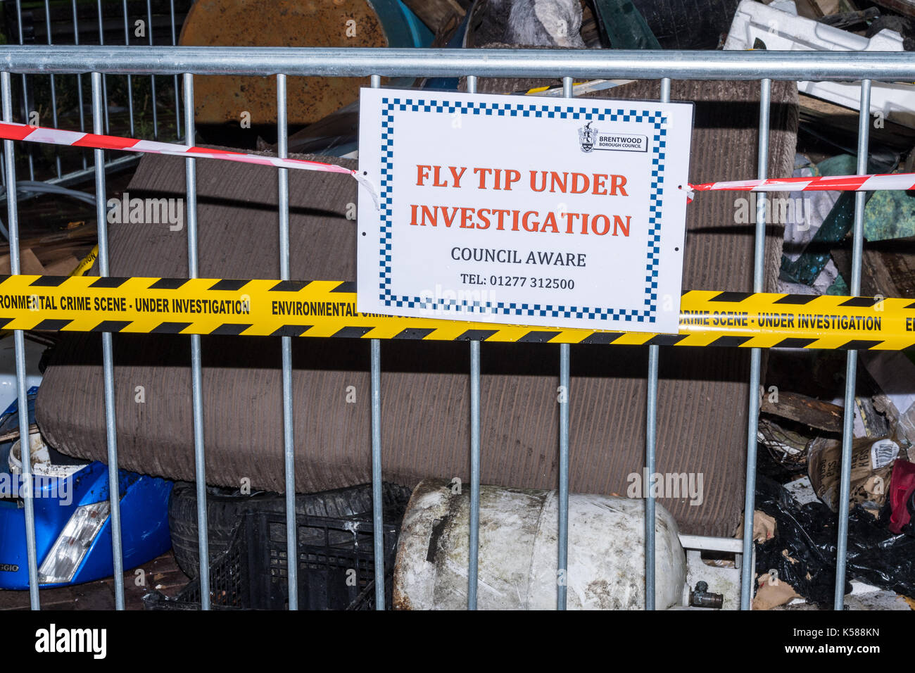 Brentwood, Essex, 8th September 2017 Anti-fly tipping campaign #crimenottocare, with a display of fly tipped rubbish in the town centre of Brentwood to raise awareness of fly tipping across Essex Credit: Ian Davidson/Alamy Live News Stock Photo