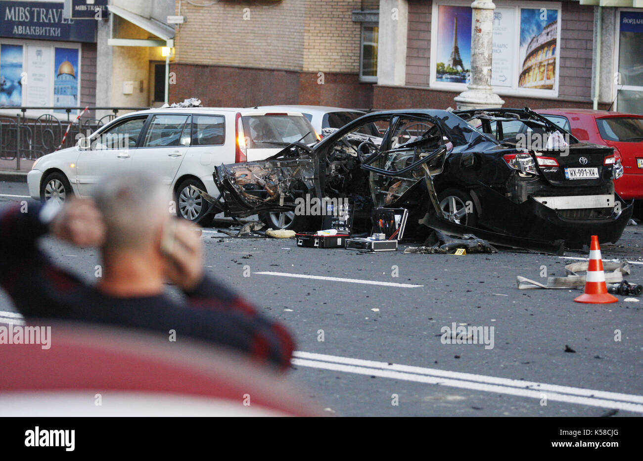 Kiev, Ukraine. 8th Sep, 2017. A man looks at an exploded car, in