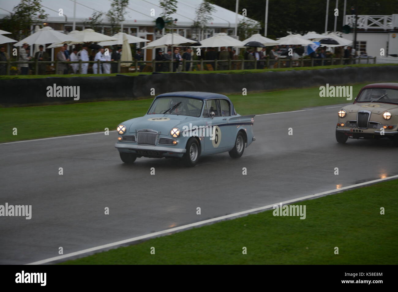 Sunbeam Rapier driven by Chris Harris; St Mary's Trophy; wet condition; Goodwood Revival 8th Sept 2017 Stock Photo