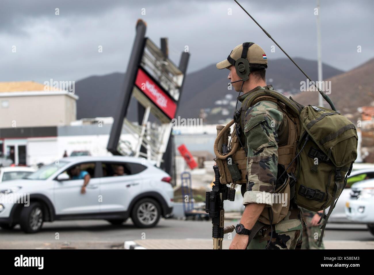 Dutch Marines stand guard to prevent looting and assist residents in the aftermath of Hurricane Irma that devastated much of the island September 7, 2017 in Philipsburg, St. Maarten. Stock Photo