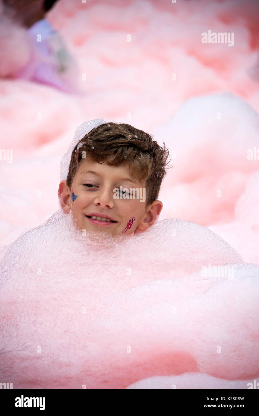 Bubble Rush 2017 at Preston Park raising funds for Demelza Hospice Care for Children, a boy