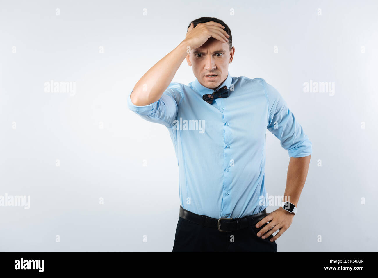 Successful man looking upset hi-res stock photography and images - Alamy