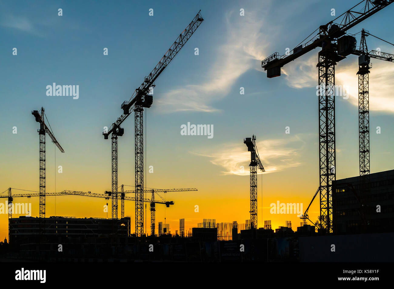 Cranes working on construction of the housing estate in former ...