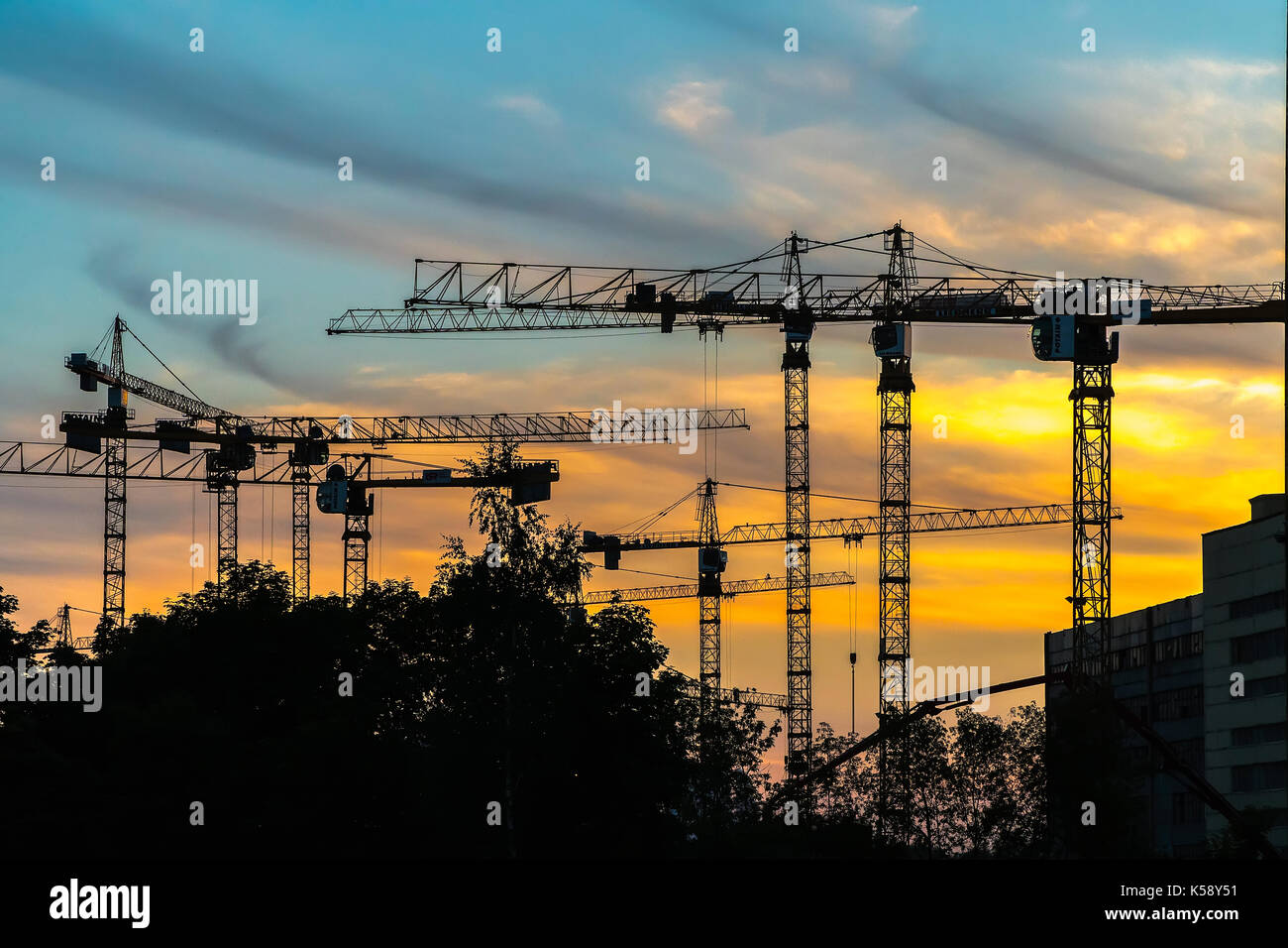 Cranes working on construction of the housing estate in former ...