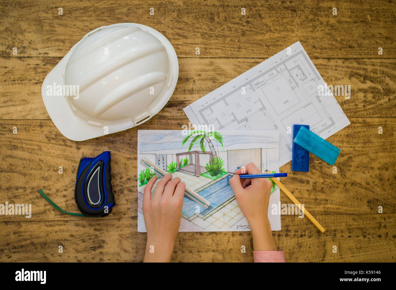 Woman working, projecting on table, architect, engineer. Stock Photo