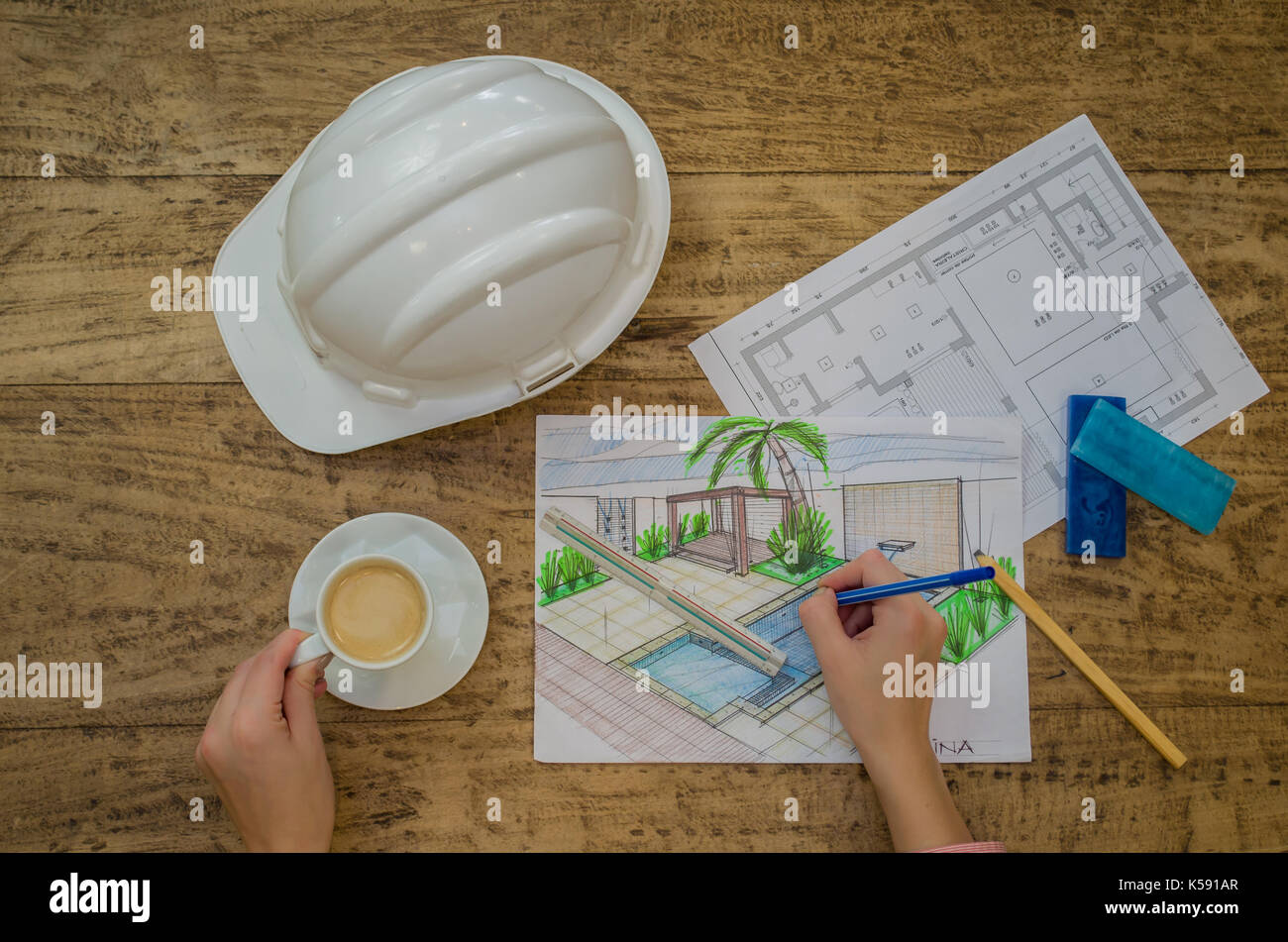 Woman working, projecting on table, architect, engineer. Stock Photo