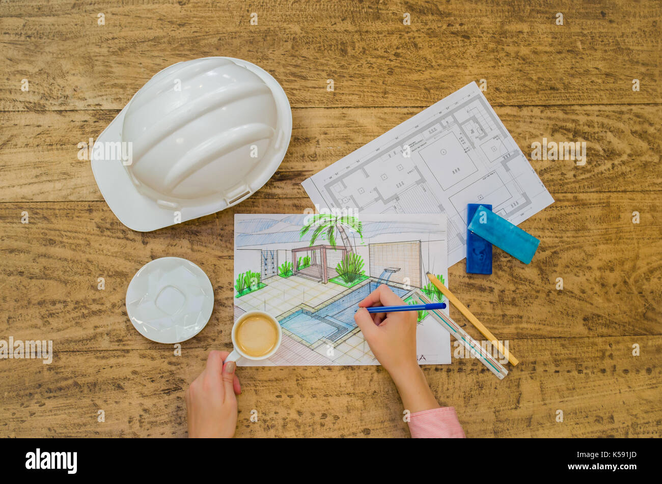Woman working, projecting on table, architect, engineer. Stock Photo