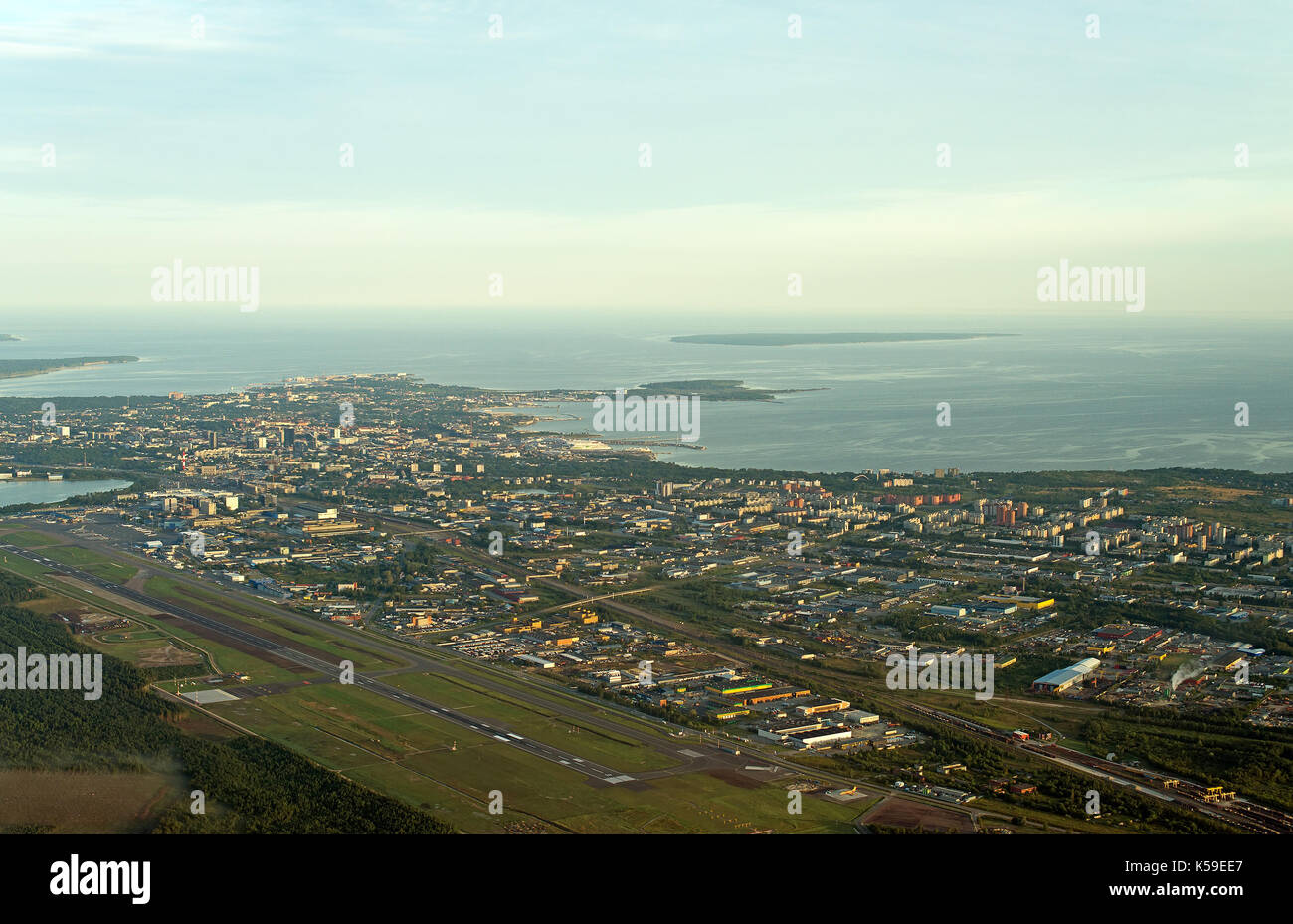 View from the plane to Tallinn airport and Lasnamae district. Stock Photo